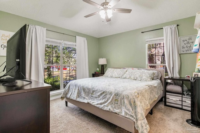 7101 Joy St Unit C8, Pensacola, FL 32504 - bedroom featuring light colored carpet, multiple windows, and ceiling fan