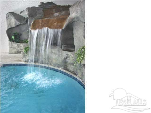 view of pool featuring pool water feature