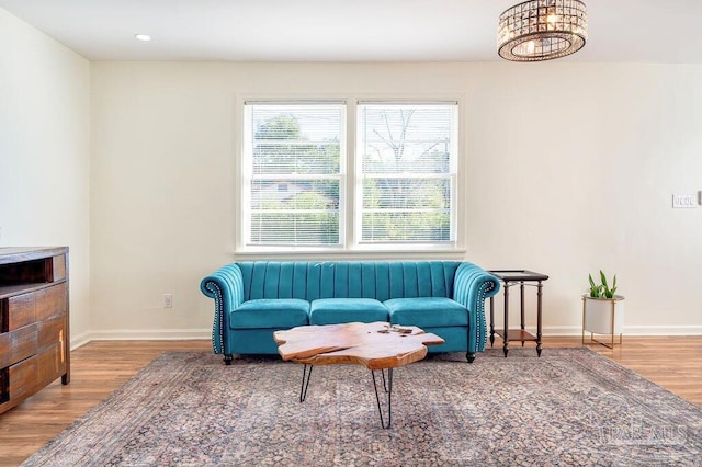 sitting room featuring hardwood / wood-style flooring