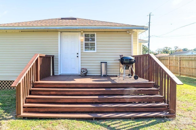 back of house featuring a wooden deck