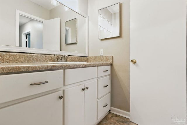 4741 Huron Dr, Pensacola, FL 32507 - bathroom with baseboards and vanity