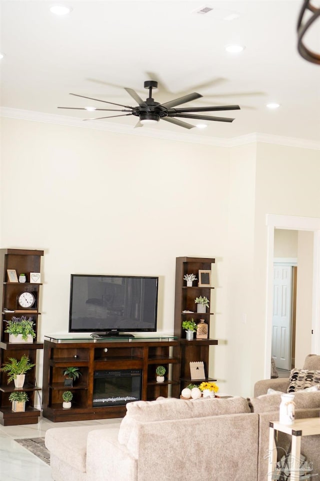 living room featuring crown molding and ceiling fan