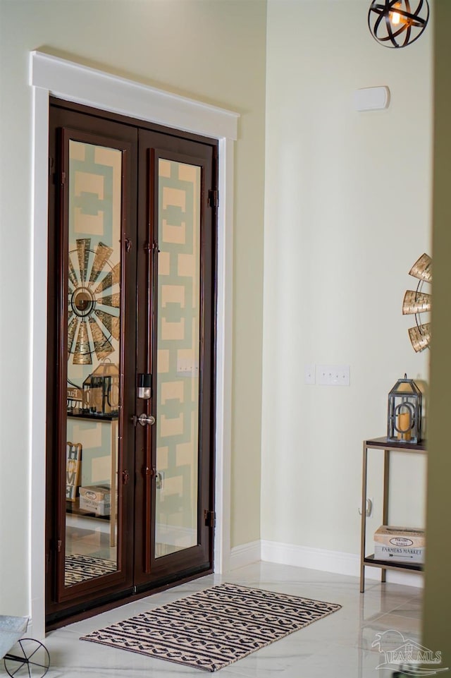 doorway to property featuring french doors