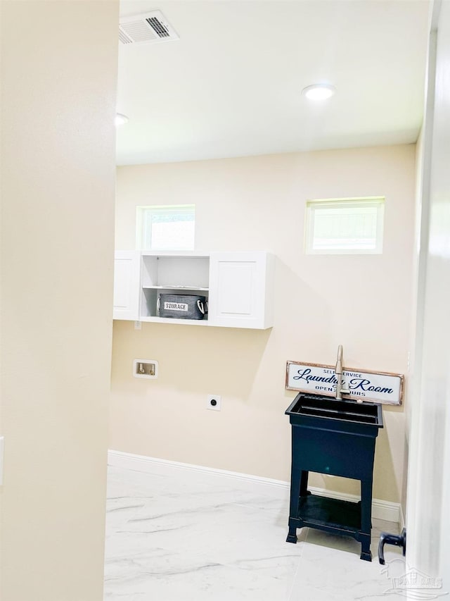 washroom featuring hookup for a washing machine and hookup for an electric dryer