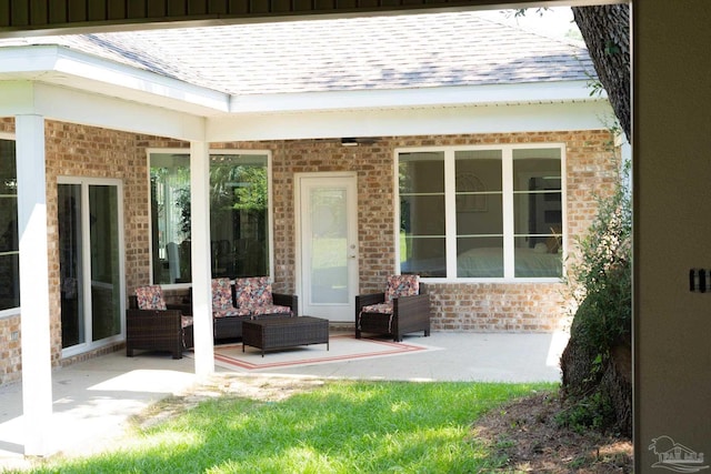 exterior space featuring outdoor lounge area