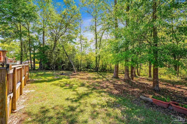 view of yard featuring fence