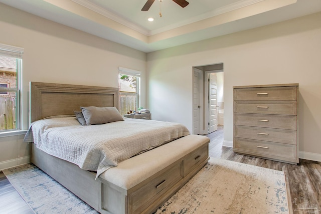 431 Broadleaf Cir, Cantonment, FL 32533 - bedroom with crown molding, baseboards, wood finished floors, recessed lighting, and a ceiling fan