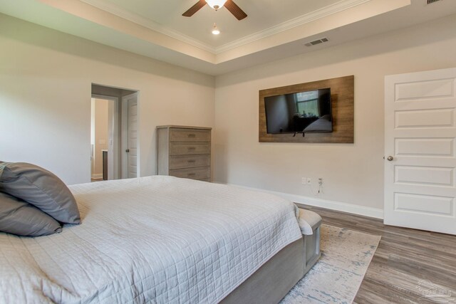 431 Broadleaf Cir, Cantonment, FL 32533 - bedroom with ornamental molding, wood finished floors, baseboards, and ceiling fan
