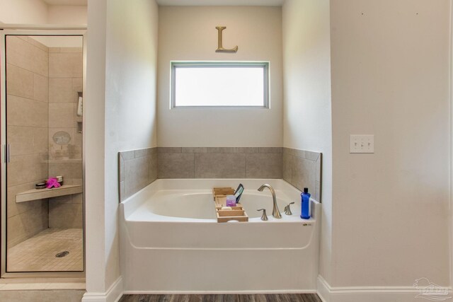 431 Broadleaf Cir, Cantonment, FL 32533 - bathroom featuring a bath and a shower stall