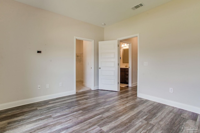 431 Broadleaf Cir, Cantonment, FL 32533 - unfurnished room featuring wood finished floors and baseboards