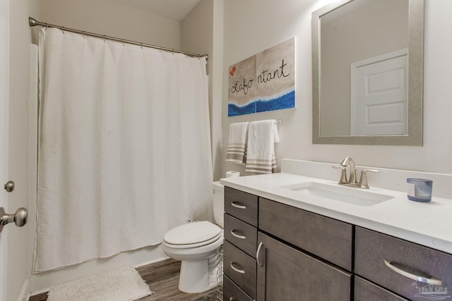 431 Broadleaf Cir, Cantonment, FL 32533 - full bath with vanity, toilet, wood finished floors, and shower / bathtub combination with curtain