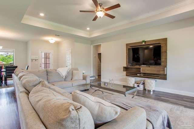 431 Broadleaf Cir, Cantonment, FL 32533 - living area with a ceiling fan, wood finished floors, baseboards, crown molding, and a raised ceiling