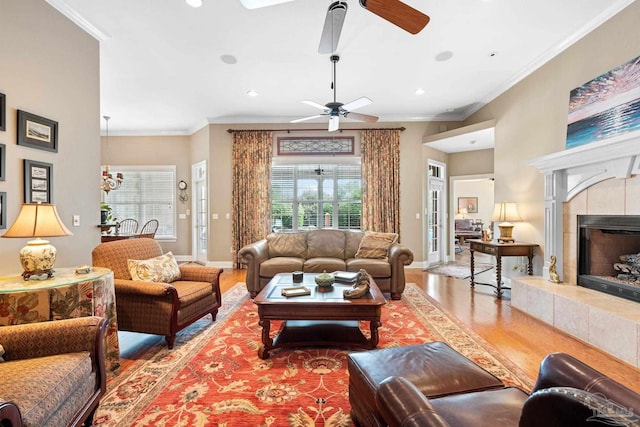 1788 Lorain Cir, Cantonment, FL 32533 - living room featuring wood finished floors, a ceiling fan, plenty of natural light, crown molding, and baseboards