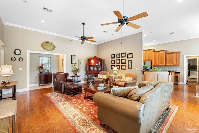 1788 Lorain Cir, Cantonment, FL 32533 - living room with a ceiling fan, crown molding, light wood-style flooring, baseboards, and recessed lighting