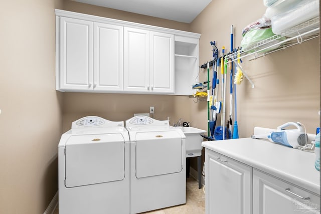 1788 Lorain Cir, Cantonment, FL 32533 - laundry room with cabinet space and washer and clothes dryer