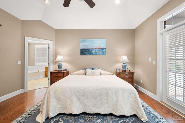 1788 Lorain Cir, Cantonment, FL 32533 - bedroom with lofted ceiling, wood finished floors, baseboards, ensuite bathroom, and ceiling fan