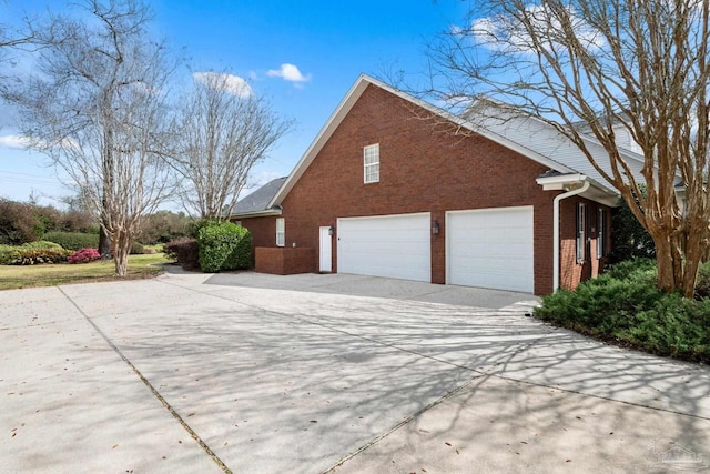 1788 Lorain Cir, Cantonment, FL 32533 - view of side of property with driveway and brick siding