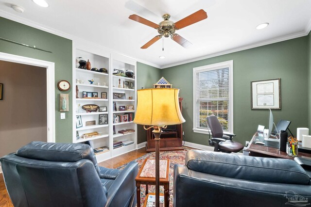 1788 Lorain Cir, Cantonment, FL 32533 - living area featuring wood finished floors, ornamental molding, a ceiling fan, baseboards, and built in shelves