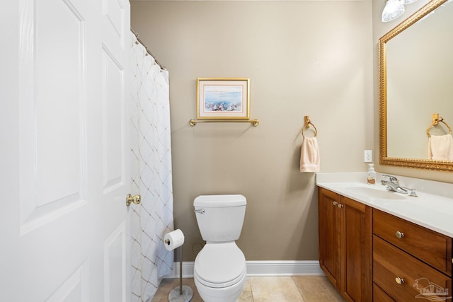 1788 Lorain Cir, Cantonment, FL 32533 - full bathroom with vanity, toilet, baseboards, and tile patterned floors