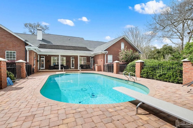 1788 Lorain Cir, Cantonment, FL 32533 - view of pool with a patio area and a diving board