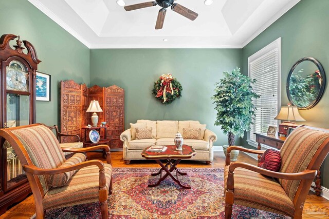 1788 Lorain Cir, Cantonment, FL 32533 - living room with a tray ceiling, a ceiling fan, ornamental molding, recessed lighting, and wood finished floors