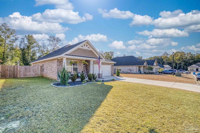 view of front of property featuring a garage and a front lawn