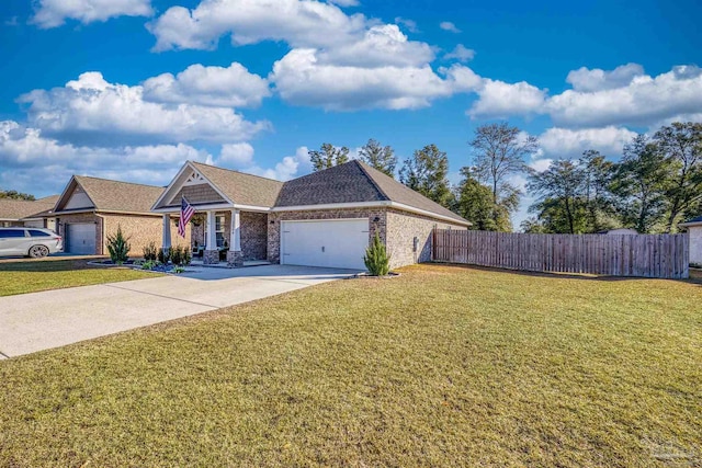 view of front of property featuring a front lawn and a garage