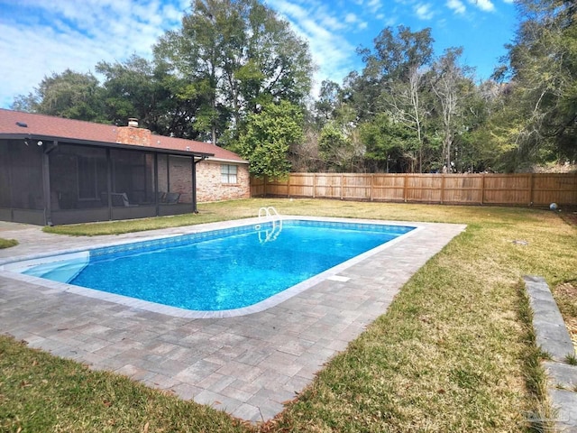view of swimming pool with a sunroom, a yard, a fenced backyard, and a fenced in pool