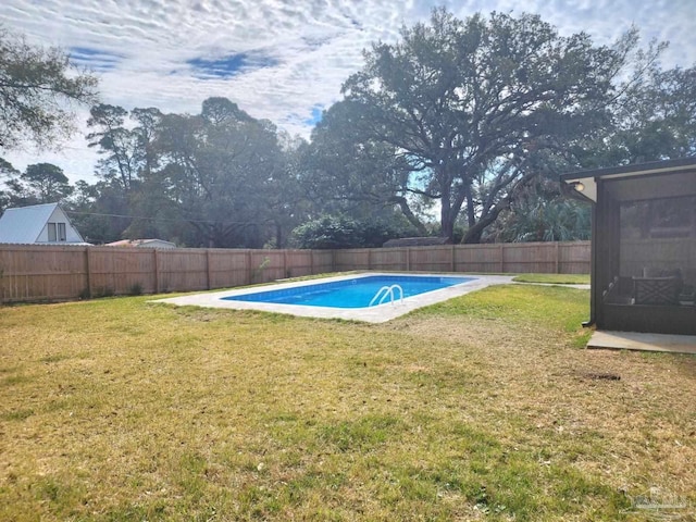 view of pool with a fenced backyard, a fenced in pool, and a lawn