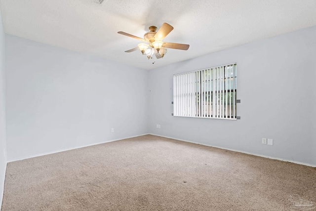 7895 Bay Meadows Dr, Pensacola, FL 32507 - unfurnished room featuring ceiling fan, carpet flooring, baseboards, and a textured ceiling