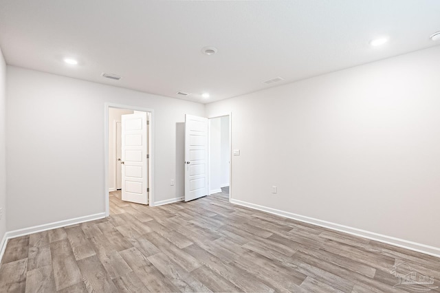 7581 Steeplechase Blvd, Pensacola, FL 32526 - unfurnished room featuring light wood-style flooring and recessed lighting