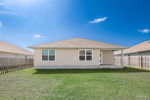 7581 Steeplechase Blvd, Pensacola, FL 32526 - rear view of house with a patio area and a fenced backyard