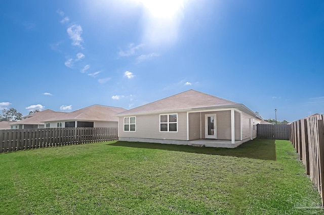 7581 Steeplechase Blvd, Pensacola, FL 32526 - rear view of house with a fenced backyard and a patio