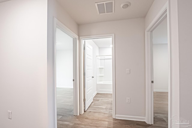 7581 Steeplechase Blvd, Pensacola, FL 32526 - hallway featuring wood finished floors and baseboards