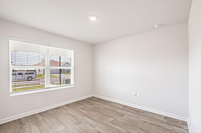 7581 Steeplechase Blvd, Pensacola, FL 32526 - empty room featuring light wood-type flooring and a smoke detector