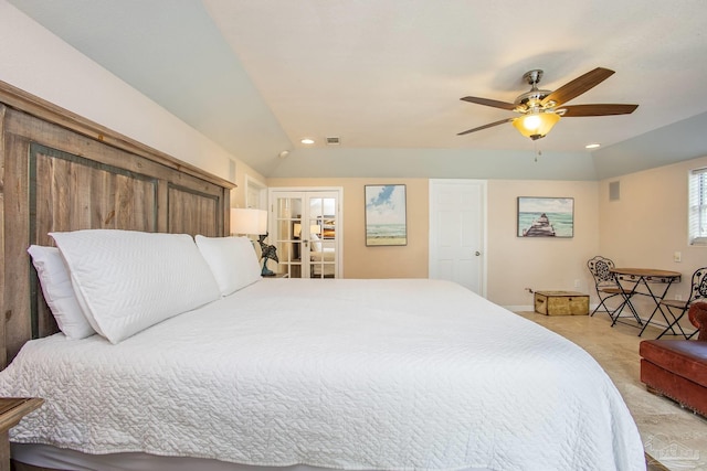 bedroom with light carpet, lofted ceiling, french doors, and ceiling fan