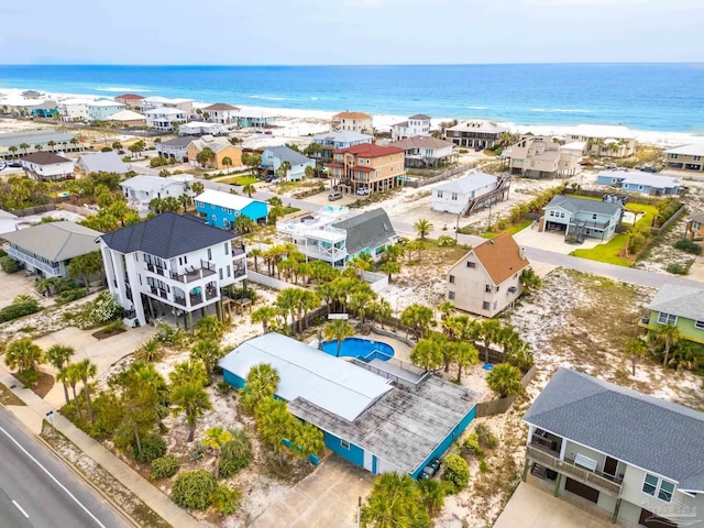 aerial view with a view of the beach and a water view