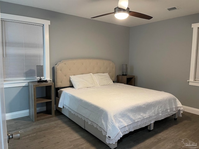 bedroom featuring hardwood / wood-style floors and ceiling fan