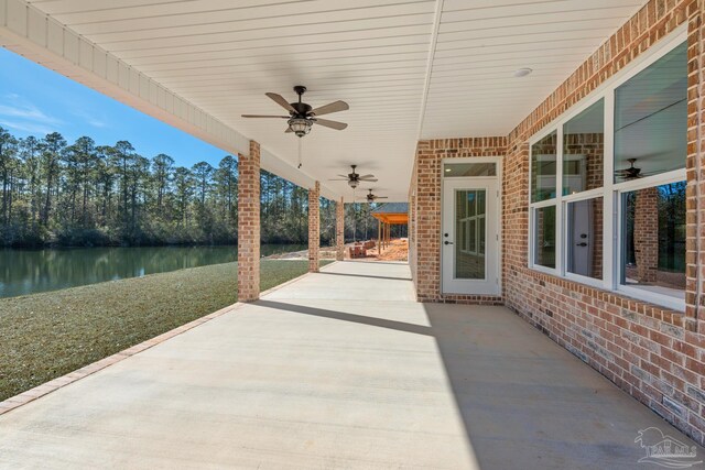 view of patio / terrace with a water view