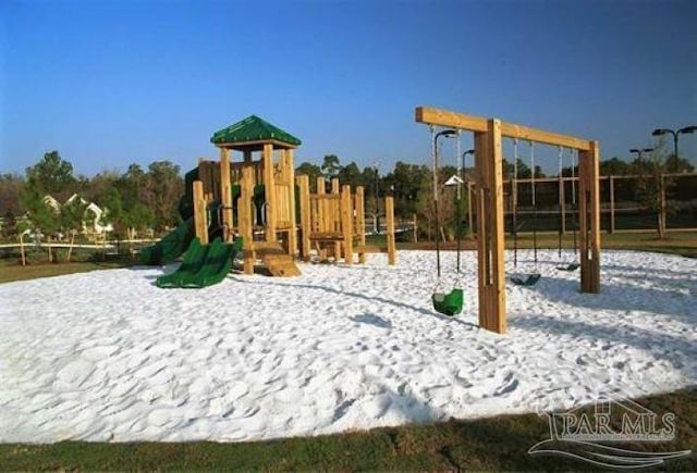 view of snow covered playground