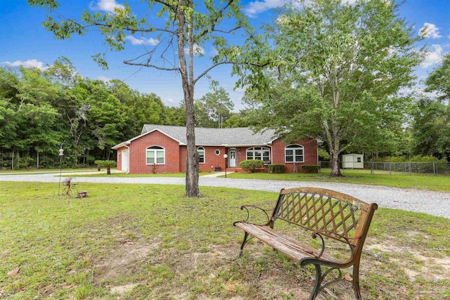 3640 Schifko Rd, Cantonment, FL 32533 - ranch-style home with brick siding and curved driveway