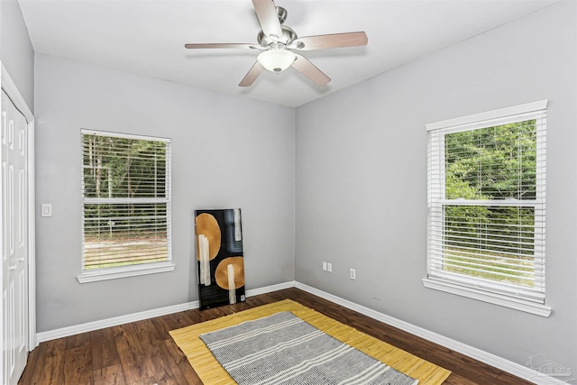 3640 Schifko Rd, Cantonment, FL 32533 - empty room with plenty of natural light, baseboards, and wood finished floors