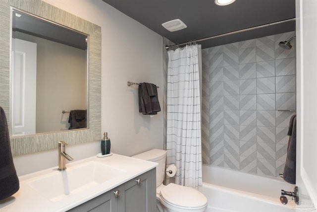 full bathroom featuring visible vents, shower / bath combo with shower curtain, toilet, and vanity