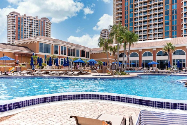 pool with a patio