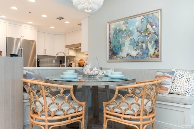 dining area featuring sink