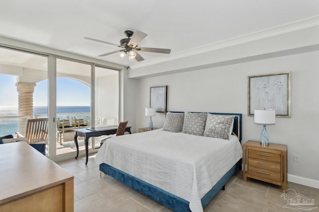18 Via Deluna Dr Unit 603, Pensacola Beach, FL 32561 - bedroom with multiple windows, a water view, access to exterior, light tile patterned floors, and crown molding