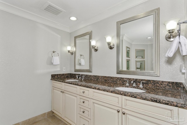 18 Via Deluna Dr Unit 603, Pensacola Beach, FL 32561 - bathroom featuring double vanity, tile patterned flooring, and crown molding