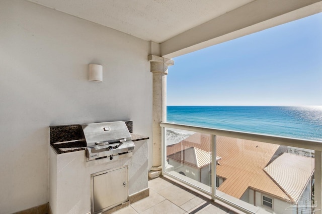 18 Via Deluna Dr Unit 603, Pensacola Beach, FL 32561 - balcony with a water view and an outdoor kitchen