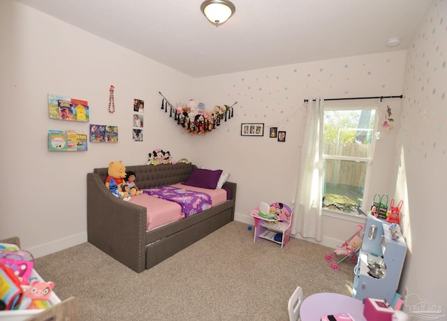 bedroom featuring carpet