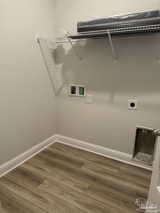 laundry area featuring washer hookup, wood-type flooring, and hookup for an electric dryer